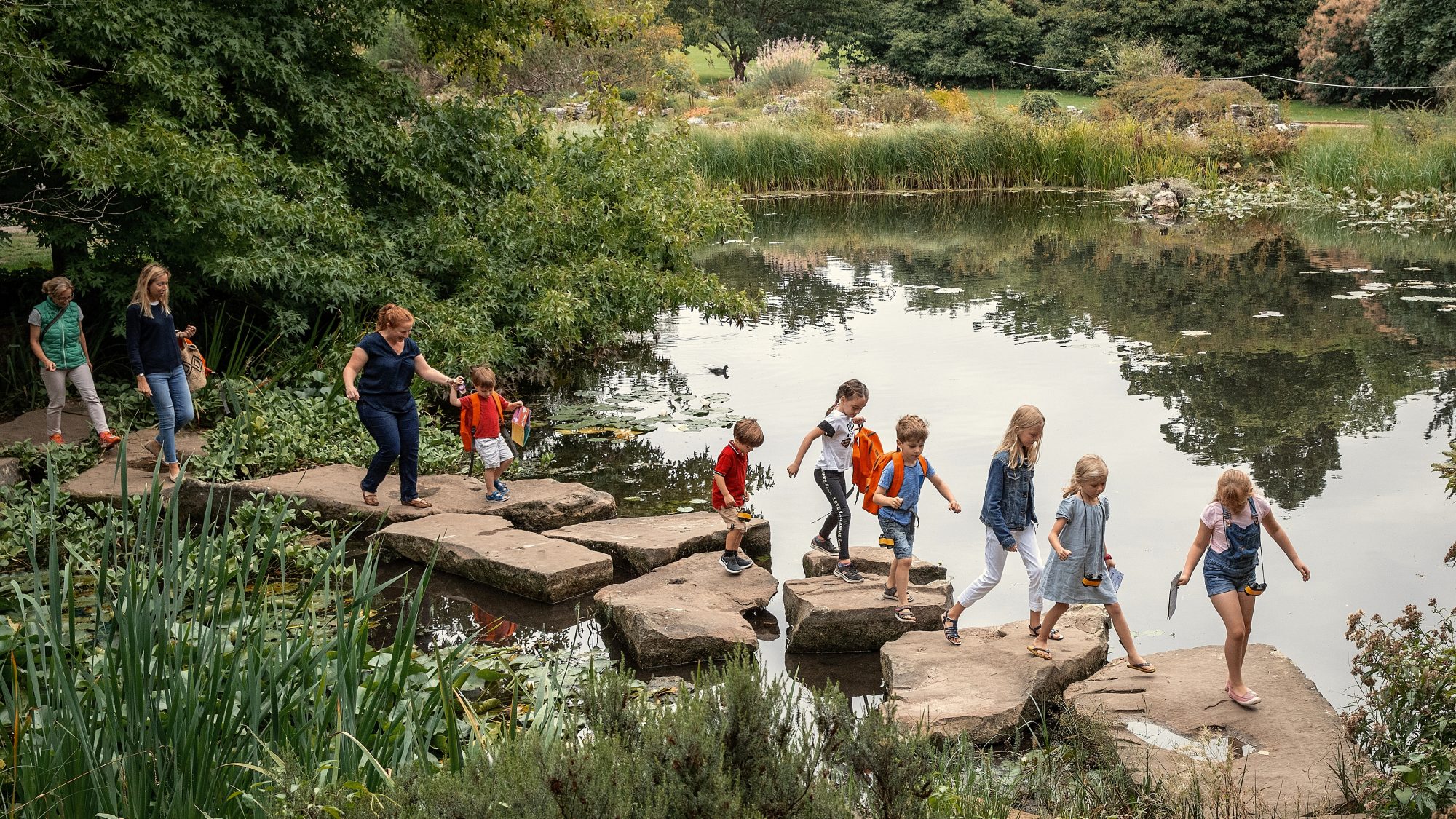 Children crossing the lake. 
