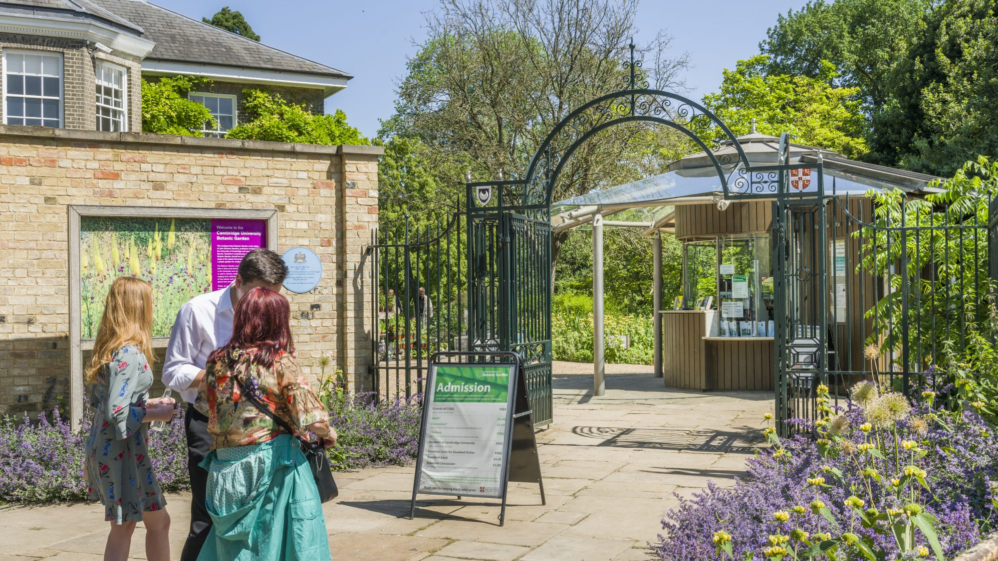 visitors walking up to the ticket office