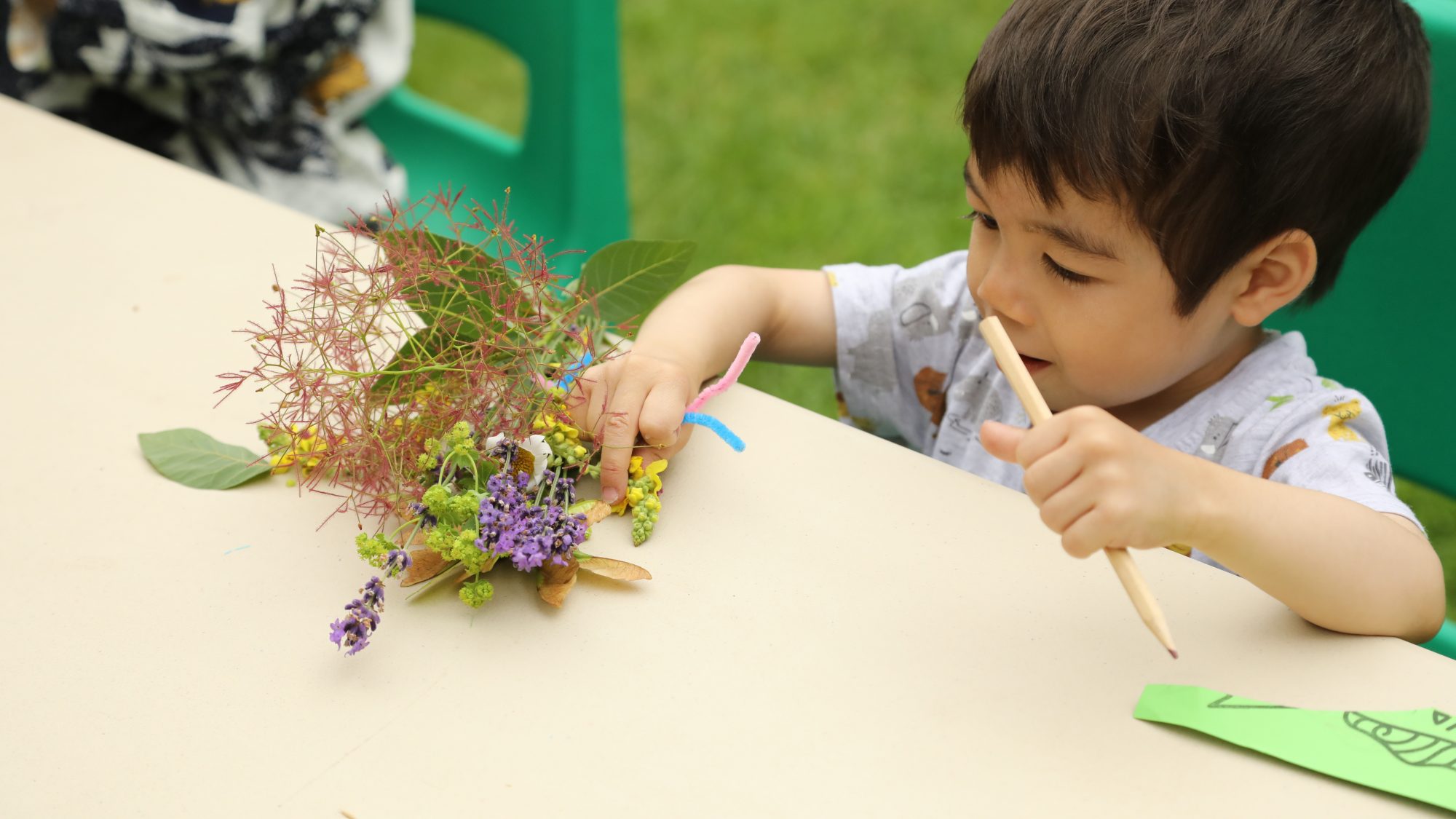 Image of child making a nature craft
