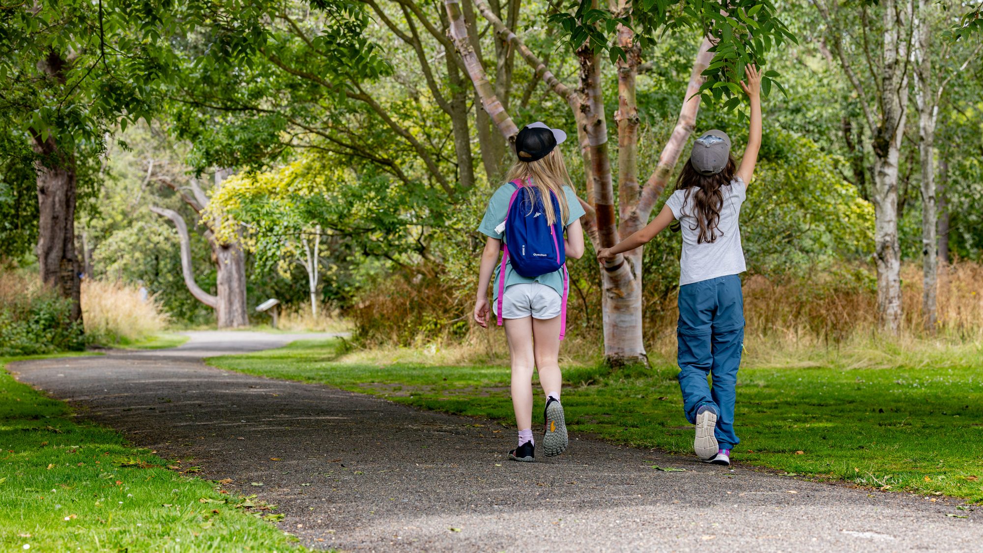 Image of two children on an adventure at the Botanic Garden.