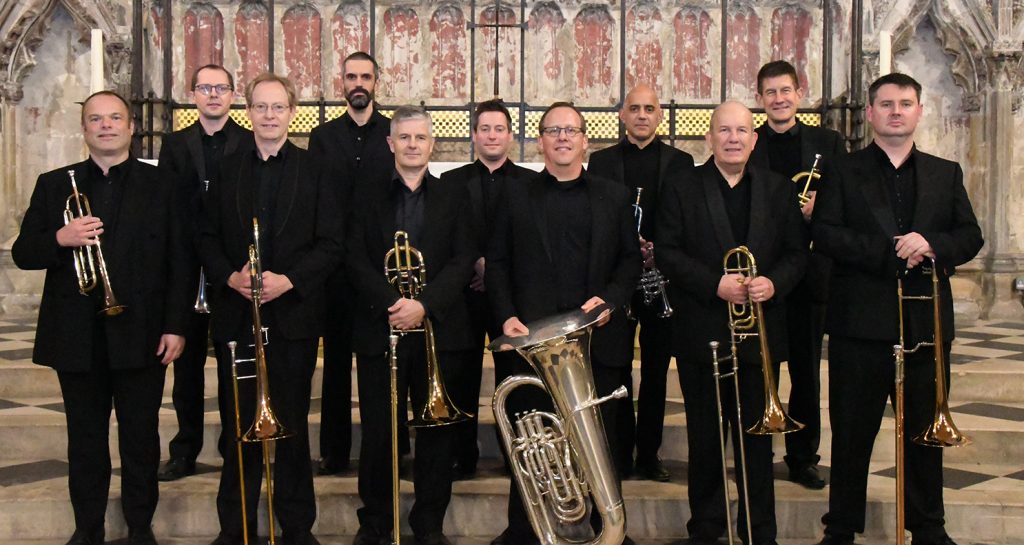 'Prime Brass' jazz band standing in a church